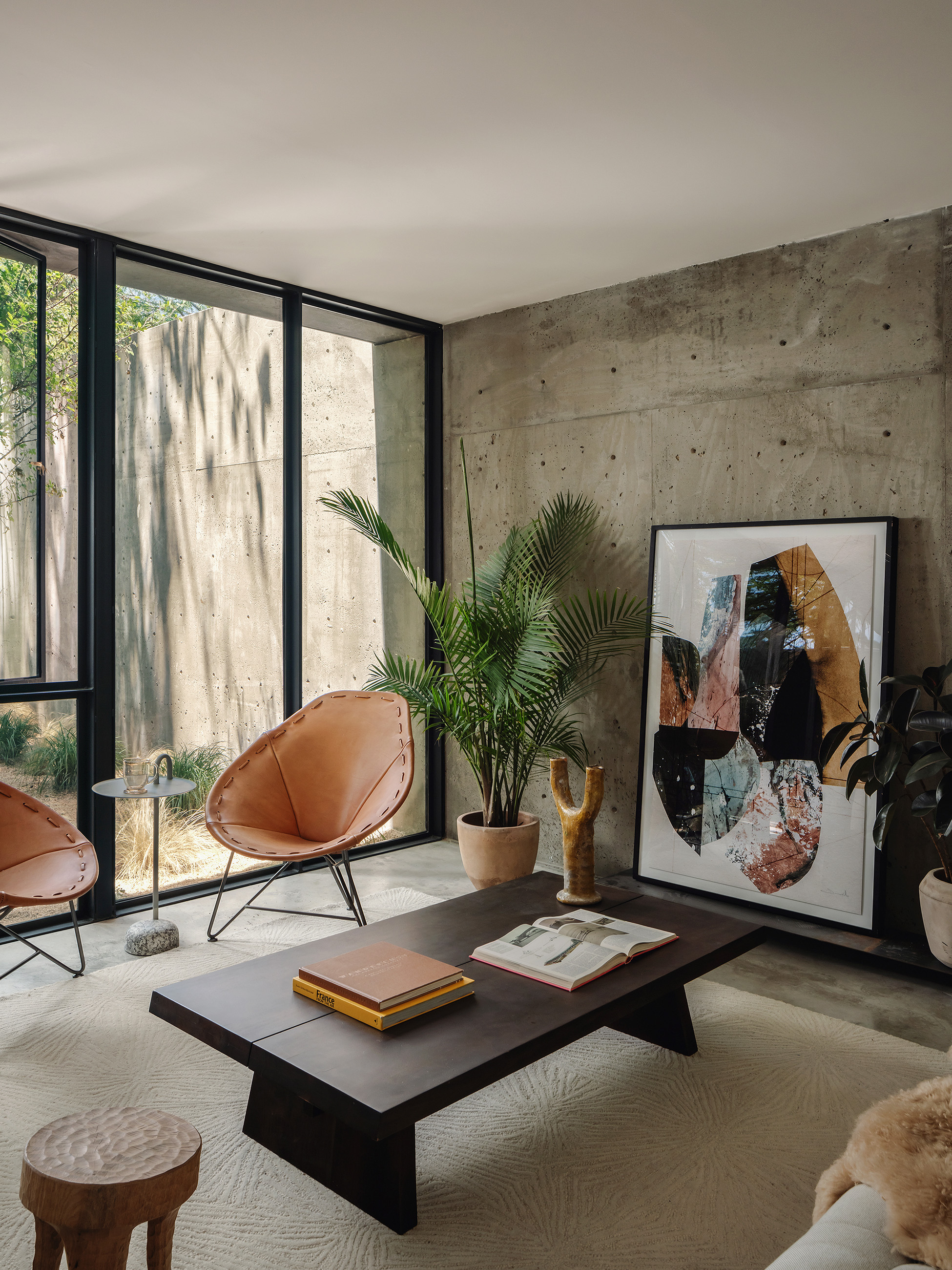 Living room with concrete feature wall
